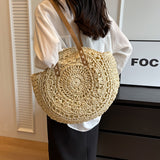 Luigia | Woven Straw Round Bag with Pattern — Natural Beige