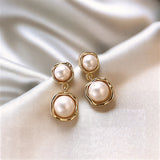 Pearl Drop Earrings with Golden Frame