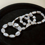 Set of 4 Bracelets with Pearls