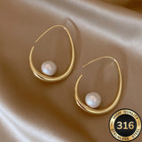 Hoop Earrings with Crescent Pearls